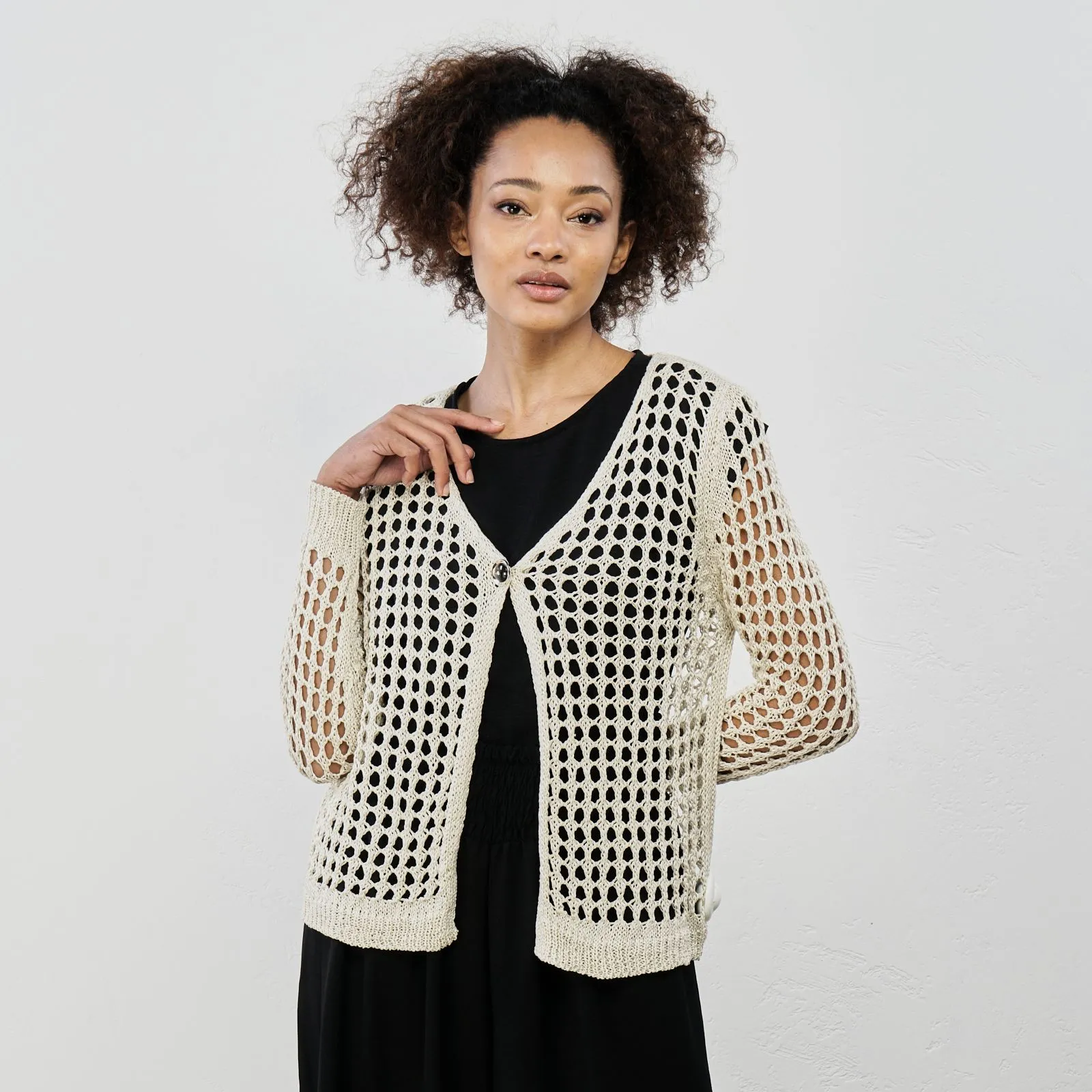 Cardigan bianco a rete con bottone