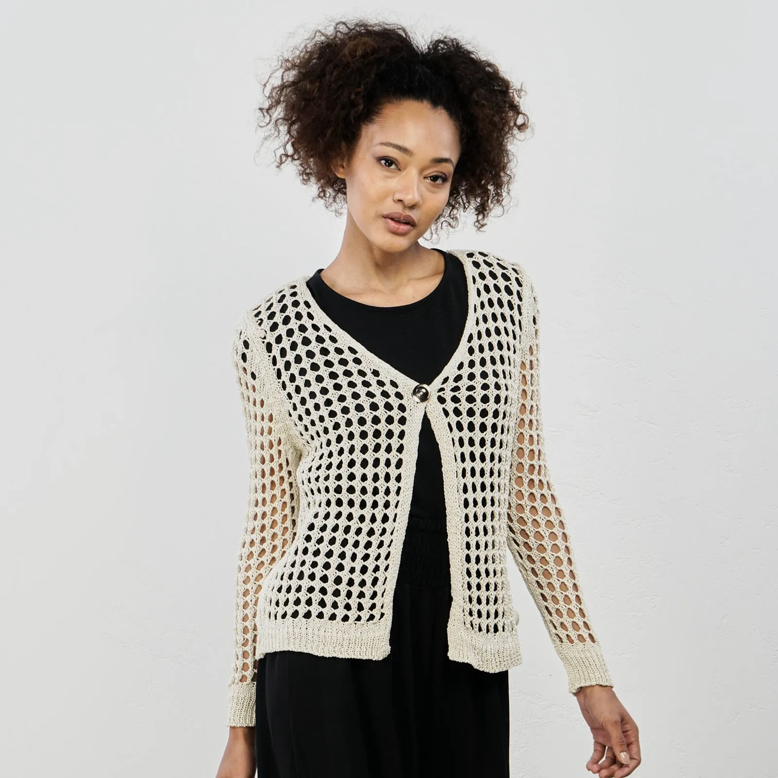 Cardigan bianco a rete con bottone