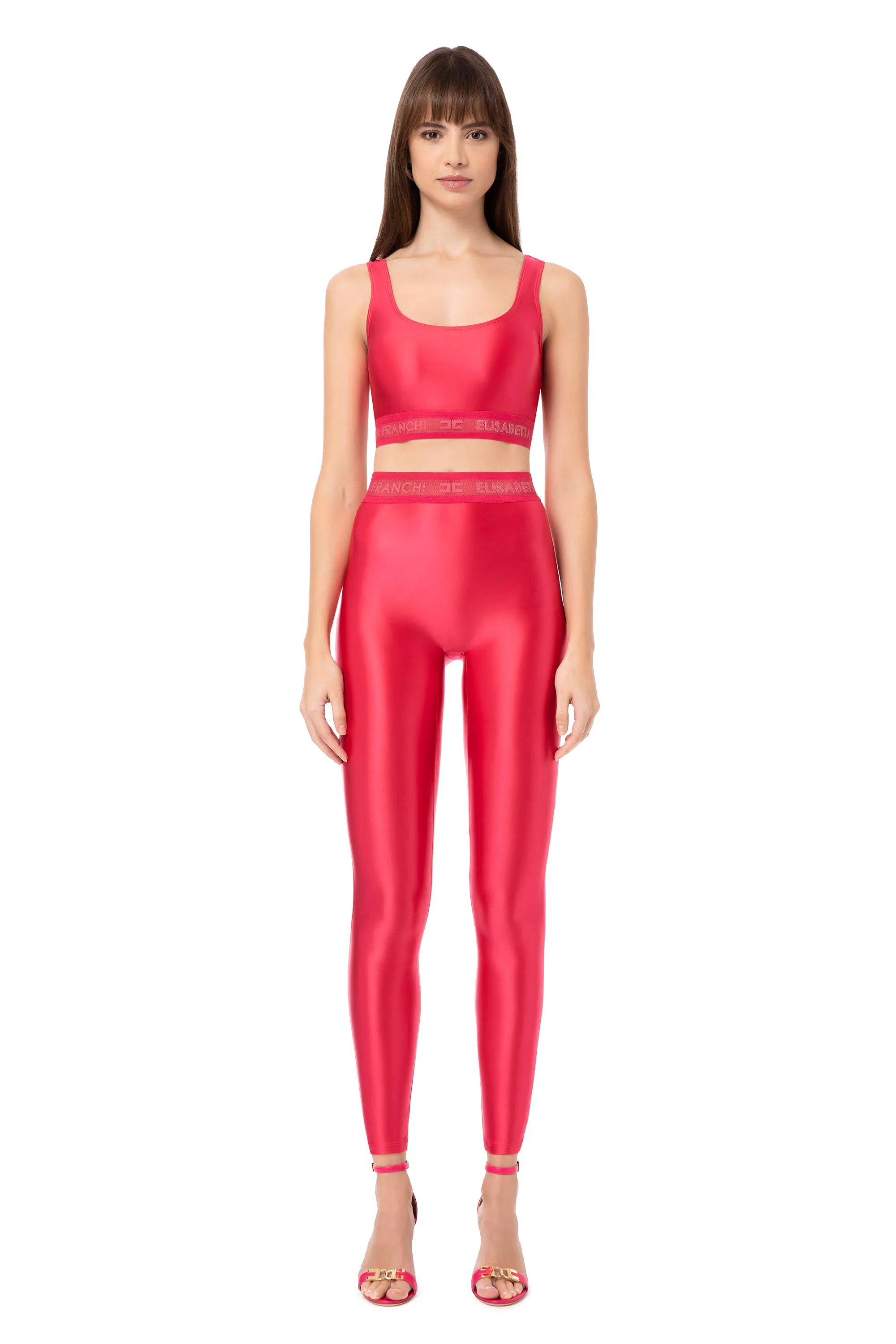 Leggings in lycra lucida con elastico logato