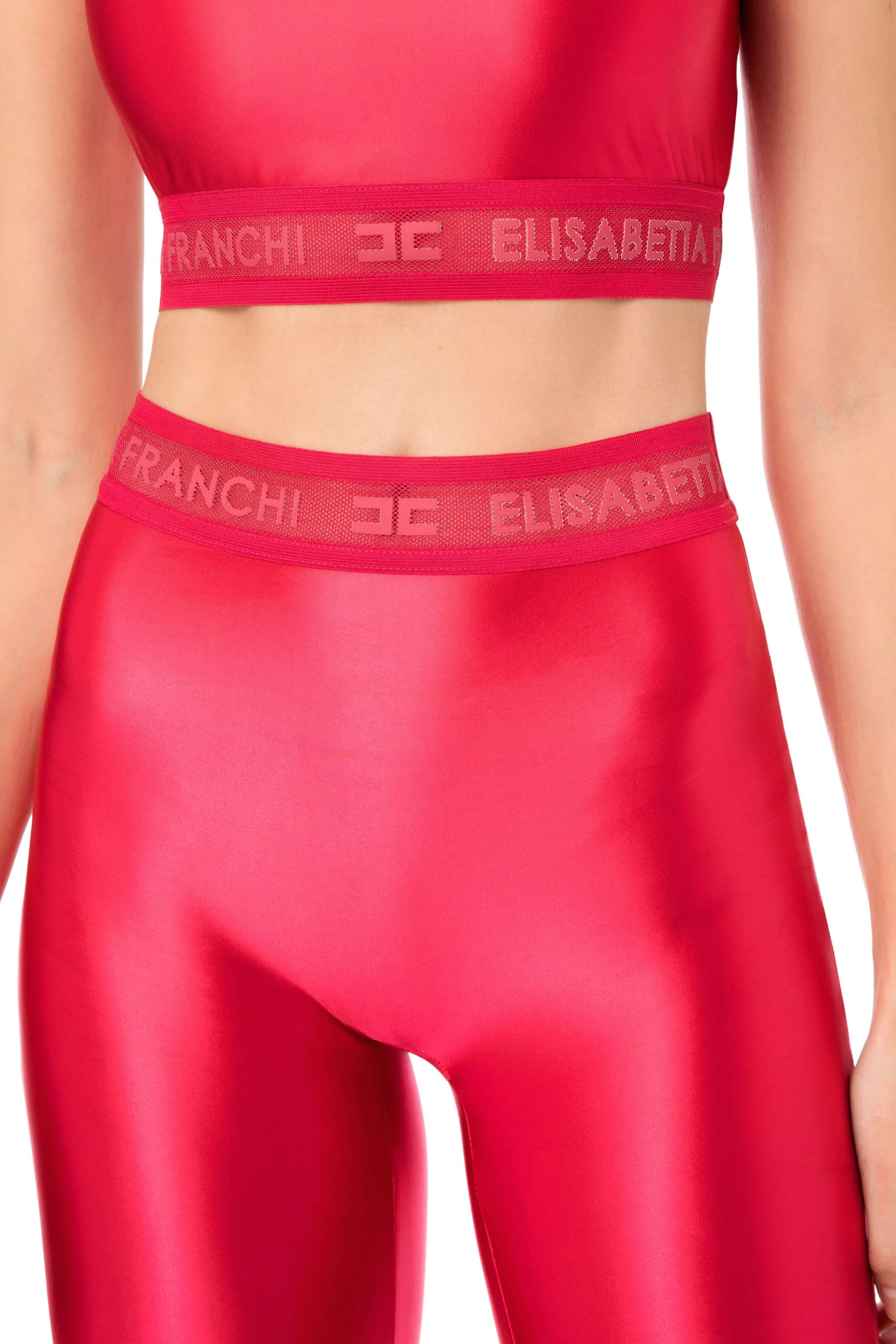 Leggings in lycra lucida con elastico logato
