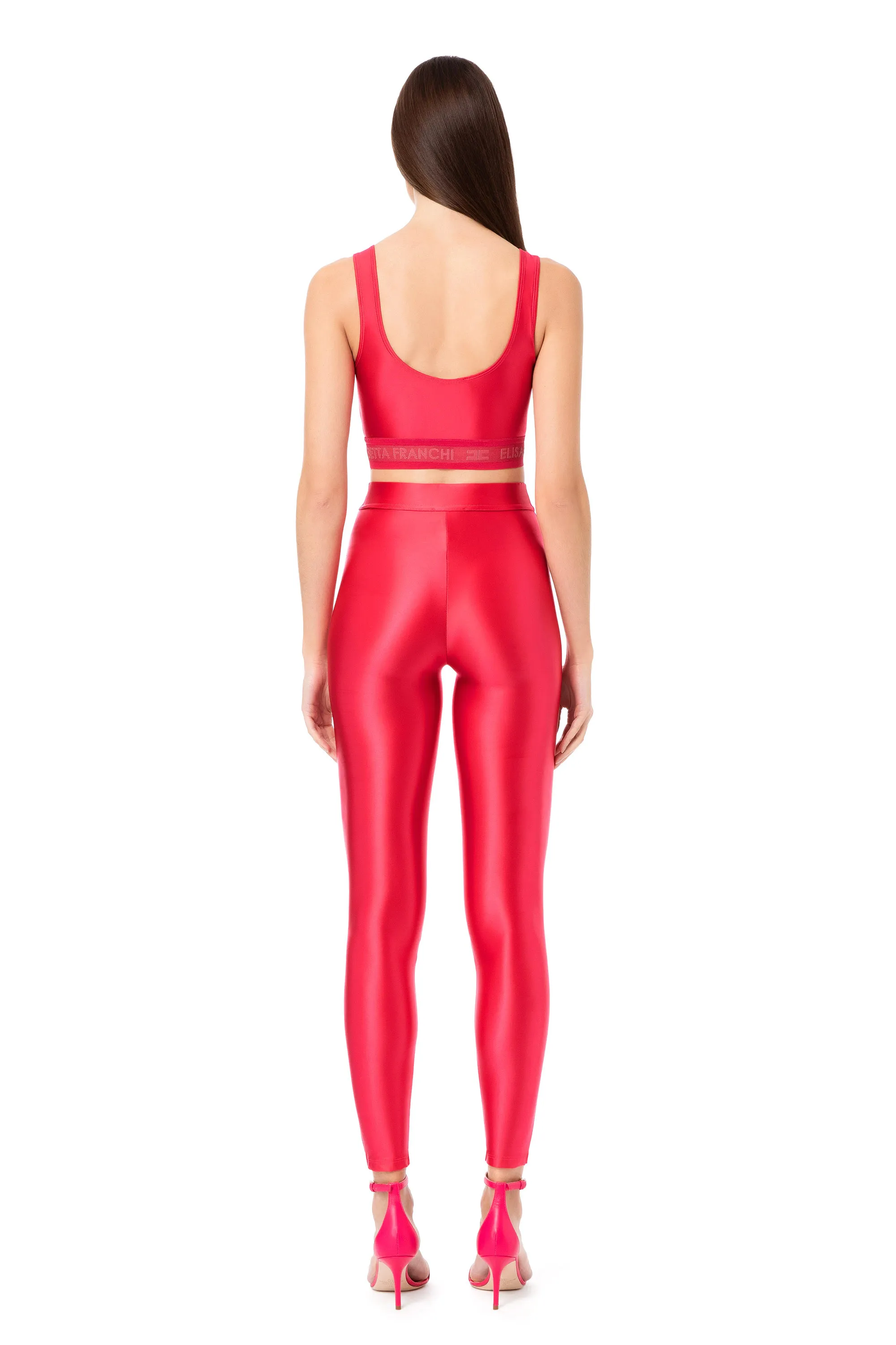 Leggings in lycra lucida con elastico logato