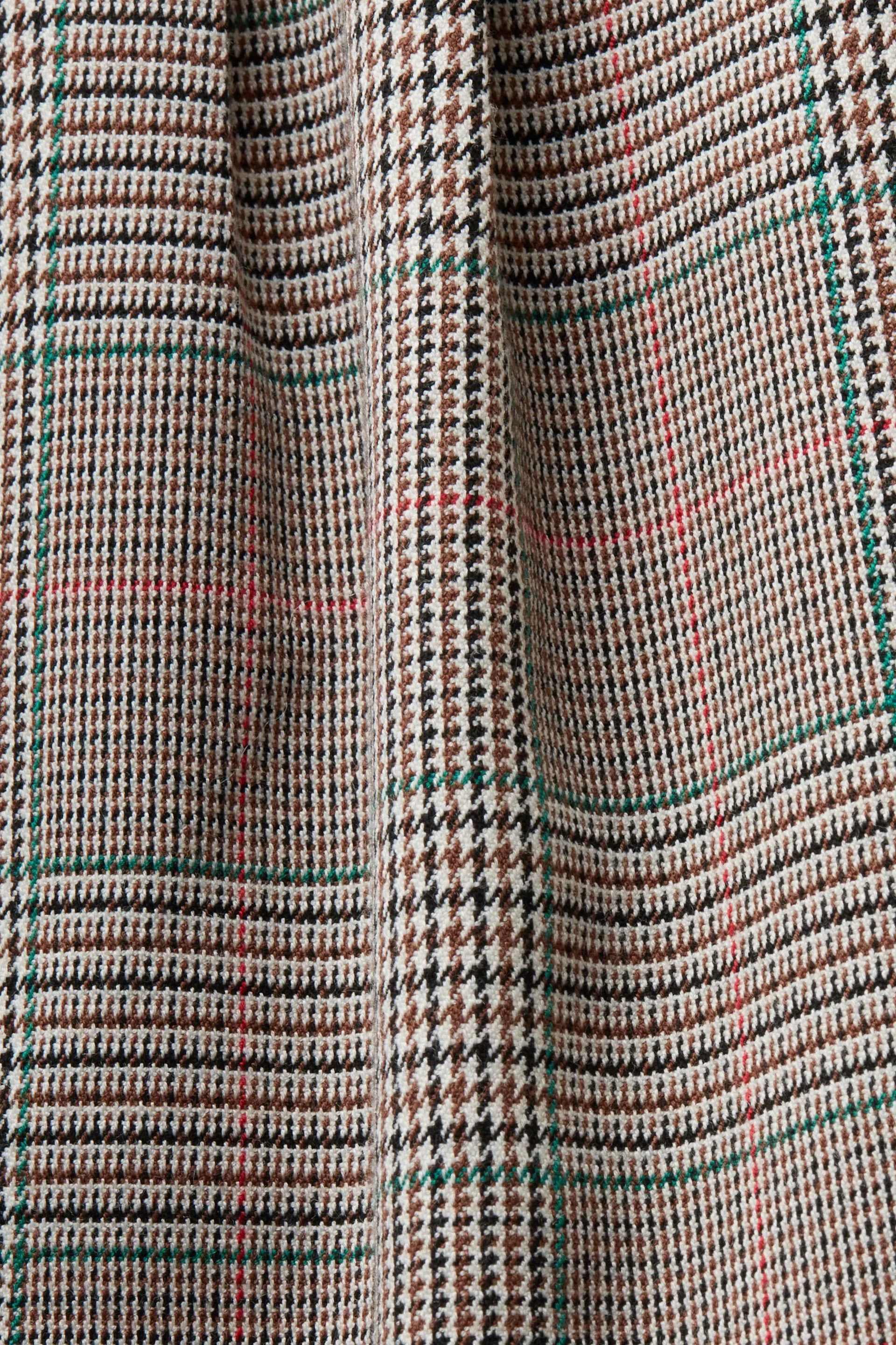 Pantaloni a quadri con gamba larga