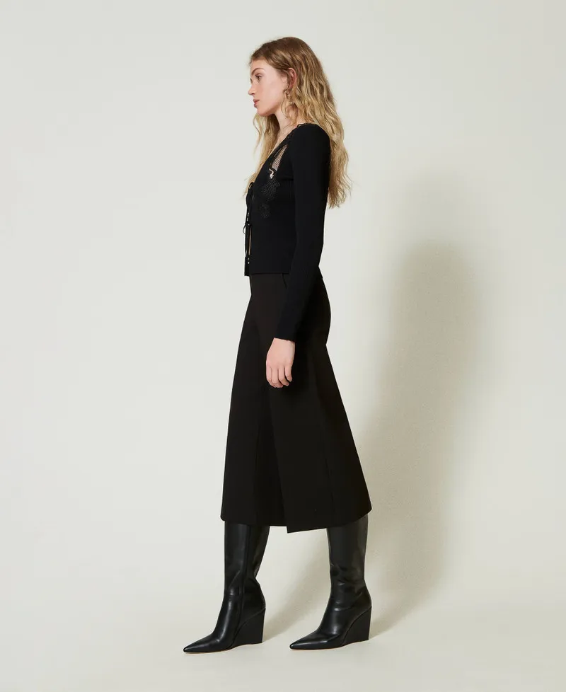 Pantaloni cropped con cinturino Oval T