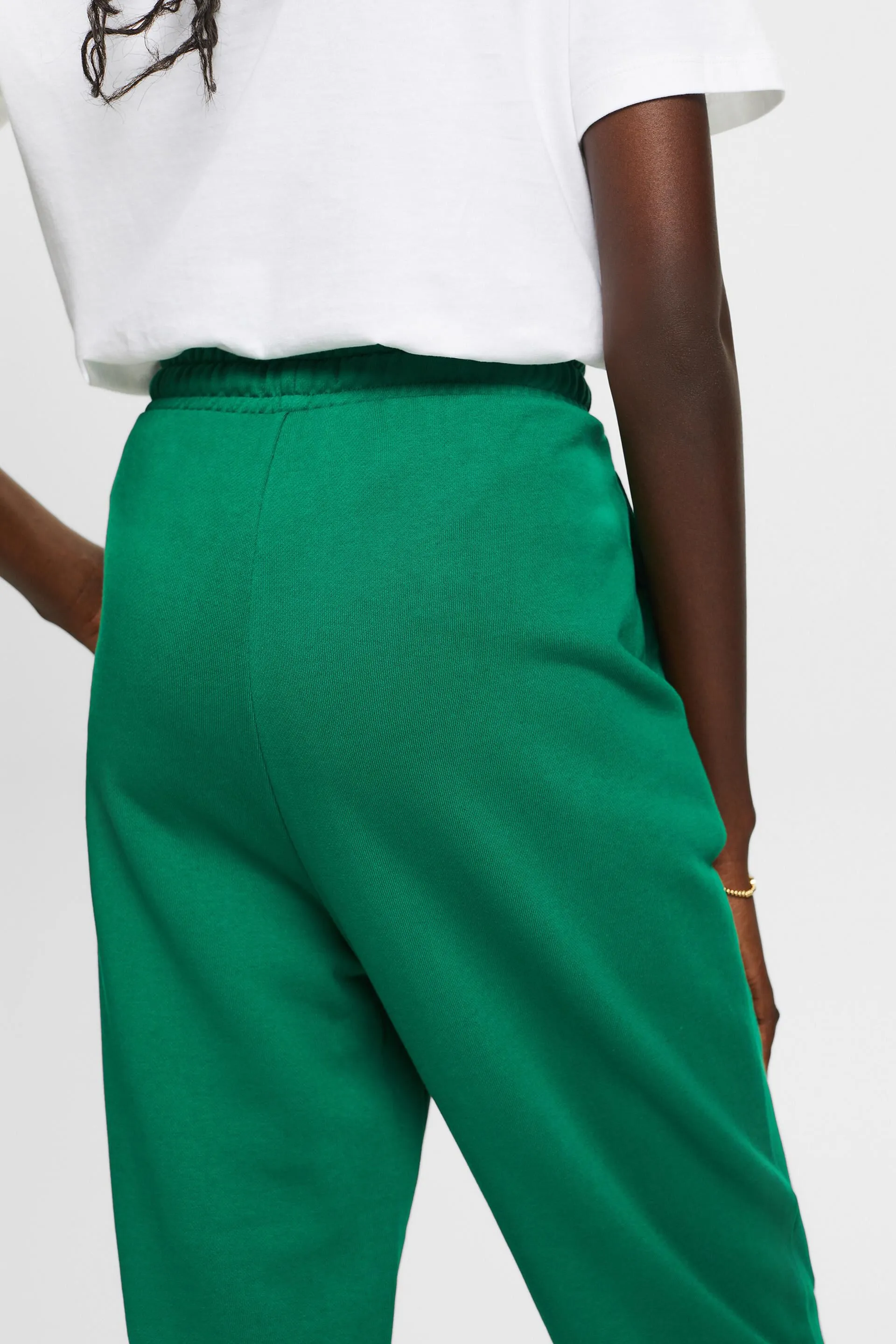 Pantaloni sportivi con logo ricamato in cotone biologico